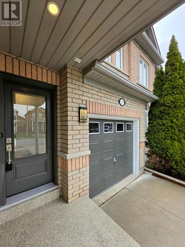 Brand new entrance door colour matched garage door - 129 Dolce Crescent, Vaughan, ON - Outdoor With Exterior