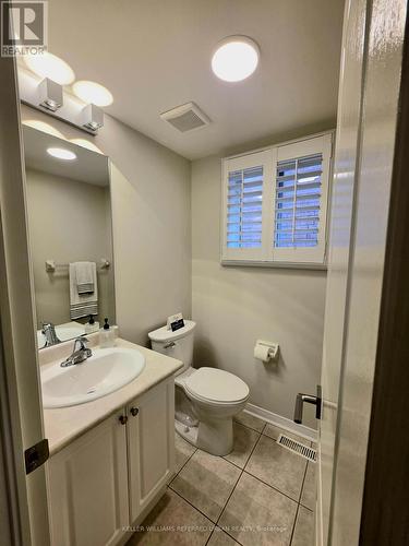 Powder room on main floor - 129 Dolce Crescent, Vaughan, ON - Indoor Photo Showing Bathroom