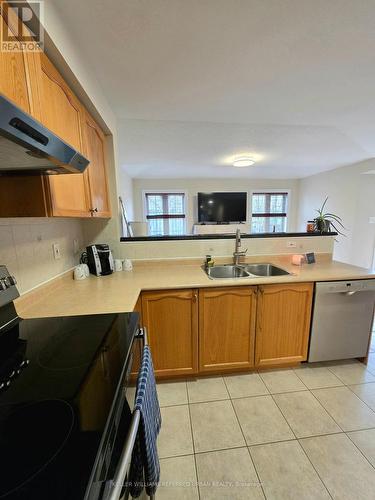 Storage like a detached home - 129 Dolce Crescent, Vaughan, ON - Indoor Photo Showing Kitchen With Double Sink