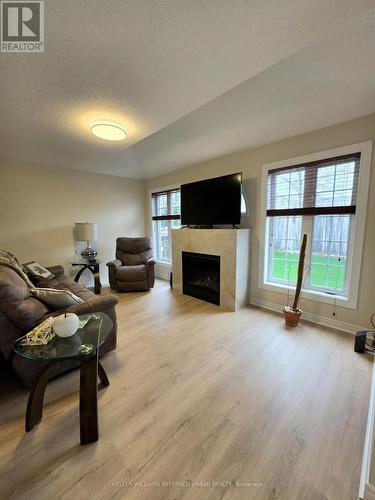 New fireplace and Marble mantle - 129 Dolce Crescent, Vaughan, ON - Indoor Photo Showing Living Room With Fireplace