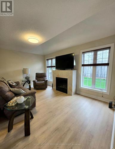 Lookout to the back yard - 129 Dolce Crescent, Vaughan, ON - Indoor Photo Showing Living Room With Fireplace