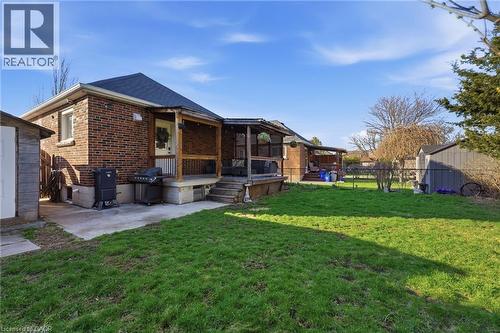 Back of house featuring brick siding, a deck, and a patio - 171 Glencairn Avenue, Hamilton, ON - Outdoor
