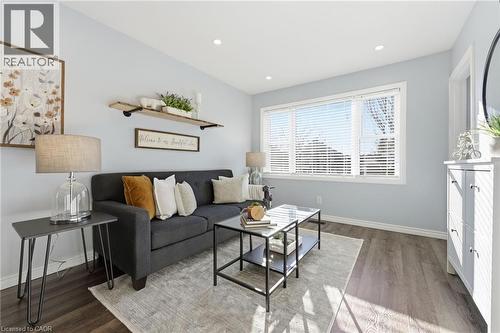 Living area with wood finished floors and recessed lighting - 171 Glencairn Avenue, Hamilton, ON - Indoor Photo Showing Living Room
