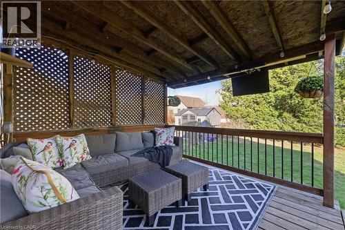 Wooden deck featuring an outdoor living space and a yard - 171 Glencairn Avenue, Hamilton, ON - Outdoor With Deck Patio Veranda With Exterior