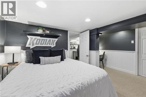 Bedroom with wainscoting, light colored carpet, and recessed lighting - 171 Glencairn Avenue, Hamilton, ON - Indoor Photo Showing Bedroom