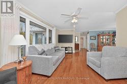 hardwood flooring throughout main living area. - 