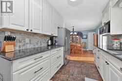 plenty of cabinets and counter space. - 
