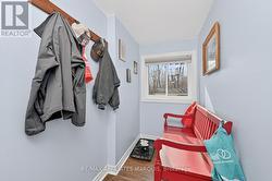 Family entrance from 2 car garage. - 