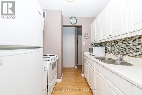710 - 359 Geneva Street, St. Catharines (Fairview), ON - Indoor Photo Showing Kitchen With Double Sink