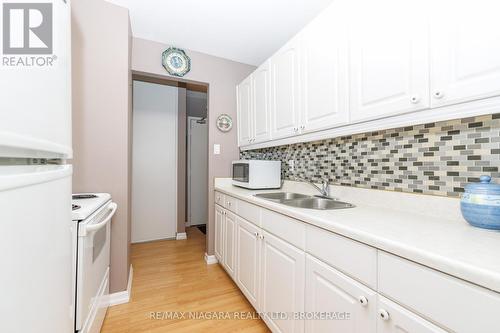 710 - 359 Geneva Street, St. Catharines (Fairview), ON - Indoor Photo Showing Kitchen With Double Sink