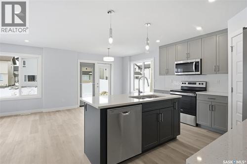 262 Kostiuk Crescent, Saskatoon, SK - Indoor Photo Showing Kitchen With Double Sink With Upgraded Kitchen