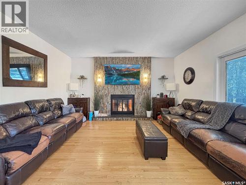 302 Nokomis Place, Saskatoon, SK - Indoor Photo Showing Living Room With Fireplace