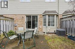 View of patio featuring outdoor dining space - 