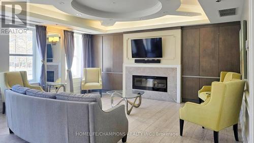 Ph17 - 28 Prince Regent Street, Markham, ON - Indoor Photo Showing Living Room With Fireplace