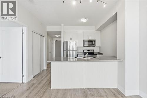 10 Concord Place Unit# 304, Grimsby, ON - Indoor Photo Showing Kitchen With Stainless Steel Kitchen With Double Sink