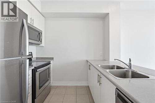 10 Concord Place Unit# 304, Grimsby, ON - Indoor Photo Showing Kitchen With Stainless Steel Kitchen With Double Sink