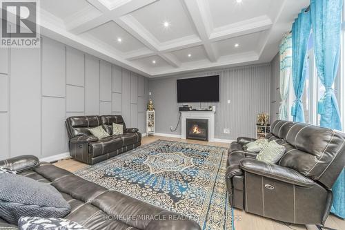 93 Trail Boulevard, Springwater, ON - Indoor Photo Showing Living Room With Fireplace