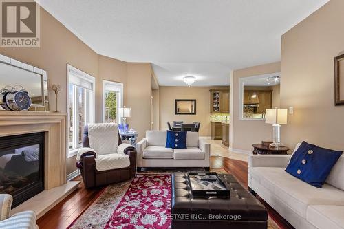 3352 Erin Centre Boulevard, Mississauga, ON - Indoor Photo Showing Living Room With Fireplace
