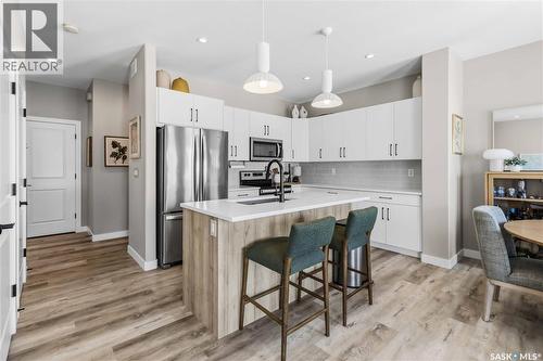 26 625 Dagnone Crescent, Saskatoon, SK - Indoor Photo Showing Kitchen With Stainless Steel Kitchen With Upgraded Kitchen