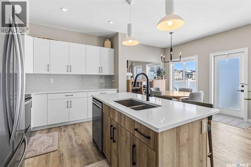 26 625 Dagnone Crescent, Saskatoon, SK - Indoor Photo Showing Kitchen With Double Sink With Upgraded Kitchen