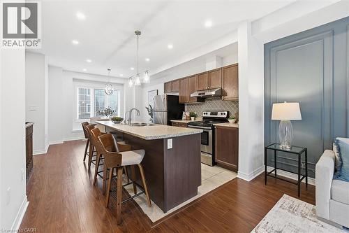 Open concept kitchen with centre island. - 122 E Dundas Street E Unit# 9, Waterdown, ON - Indoor Photo Showing Kitchen With Double Sink With Upgraded Kitchen