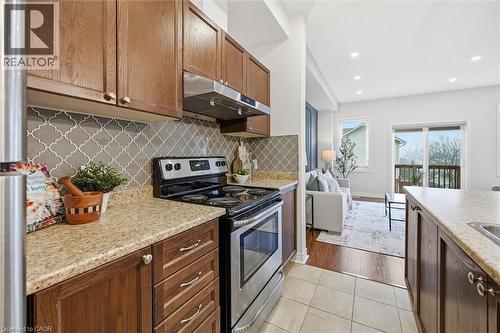 Stainless steel appliances, upgraded exhaust fan 1450 cfm. - 122 E Dundas Street E Unit# 9, Waterdown, ON - Indoor Photo Showing Kitchen