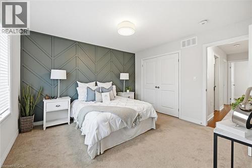 Spacious double closet. - 122 E Dundas Street E Unit# 9, Waterdown, ON - Indoor Photo Showing Bedroom