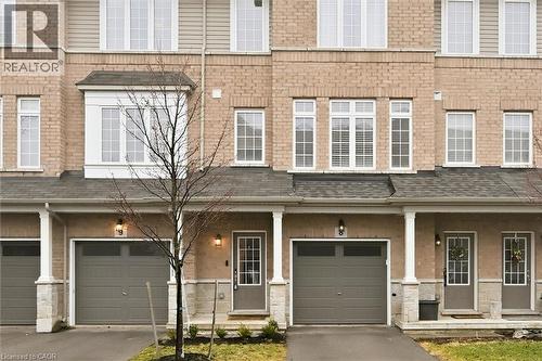 Quiet community enclave located on a cul de sac. - 122 E Dundas Street E Unit# 9, Waterdown, ON - Outdoor With Facade
