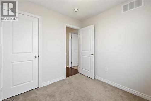 Window and closet - 122 E Dundas Street E Unit# 9, Waterdown, ON - Indoor Photo Showing Other Room