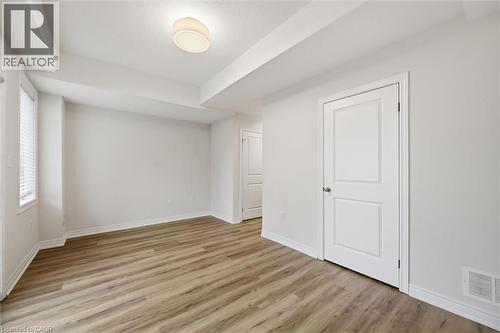 Utility, Laundry and convenient access to garage. - 122 E Dundas Street E Unit# 9, Waterdown, ON - Indoor Photo Showing Other Room