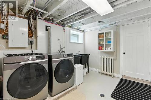Laundry area with laundry tub - 98 Kensington Avenue S, Hamilton, ON - Indoor Photo Showing Laundry Room