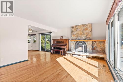 13 Weir Crescent, Saskatoon, SK - Indoor With Fireplace