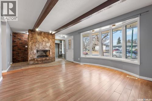 55 Rothwell Crescent, Regina, SK - Indoor Photo Showing Living Room With Fireplace