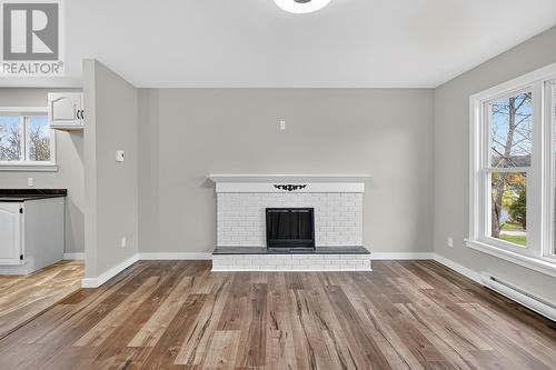 32 Church Road, Victoria, NL - Indoor Photo Showing Living Room With Fireplace