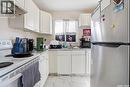 2123 Reynolds Street, Regina, SK  - Indoor Photo Showing Kitchen With Double Sink 