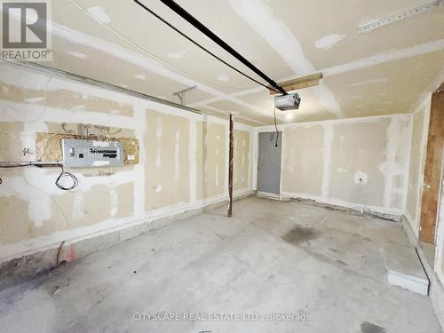 Garage - 5797 Tiz Road, Mississauga, ON - Indoor Photo Showing Garage