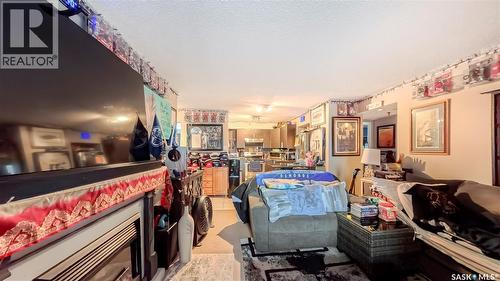 706 405 5Th Avenue N, Saskatoon, SK - Indoor With Fireplace