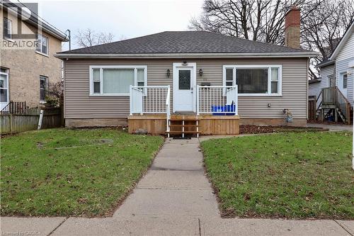 Bungalow featuring roof with shingles and a wooden deck - 80 Roseview Avenue, Cambridge, ON - Outdoor