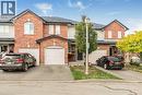 Traditional home with brick siding, driveway, and a garage - 311 Highway 8 Unit# 12, Stoney Creek, ON  - Outdoor With Facade 