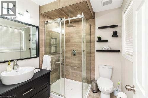 Bathroom with vanity and a shower stall - 311 Highway 8 Unit# 12, Stoney Creek, ON - Indoor Photo Showing Bathroom