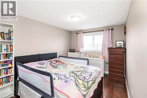 Bedroom with dark wood finished floors - 311 Highway 8 Unit# 12, Stoney Creek, ON - Indoor Photo Showing Bedroom