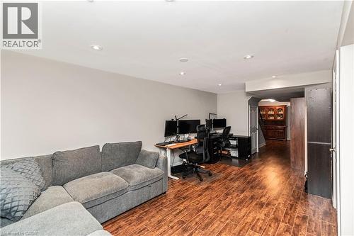 Office featuring dark wood-type flooring and recessed lighting - 311 Highway 8 Unit# 12, Stoney Creek, ON - Indoor