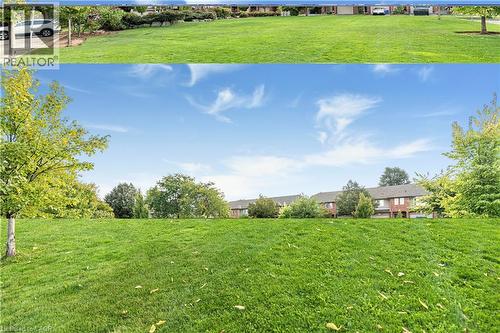 View of grassy yard - 311 Highway 8 Unit# 12, Stoney Creek, ON - Outdoor With View