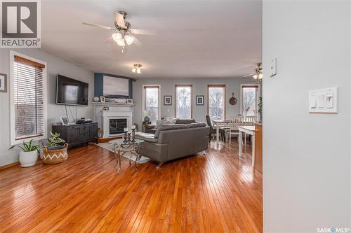 25 Alice Crescent, North Grove, SK - Indoor Photo Showing Living Room With Fireplace