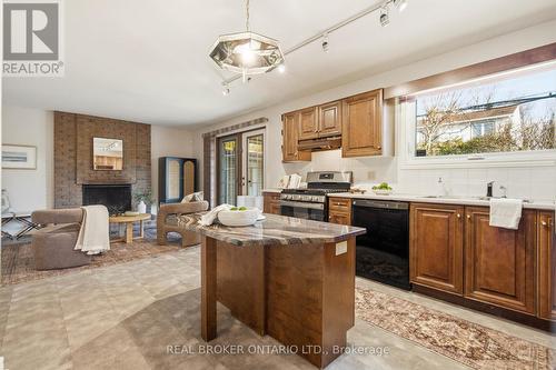 1294 Fernwood Drive, Ottawa, ON - Indoor Photo Showing Kitchen With Fireplace
