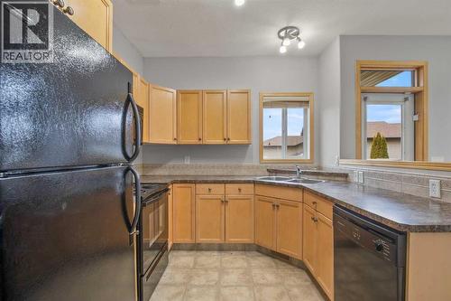 1 Ivey Close, Red Deer, AB - Indoor Photo Showing Kitchen With Double Sink