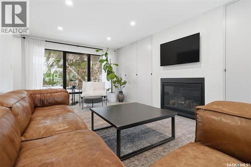 3610 Balfour Court, Saskatoon, SK - Indoor Photo Showing Living Room With Fireplace