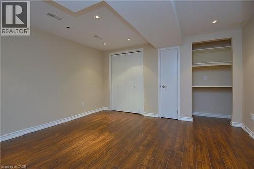 Unfurnished bedroom with dark wood-type flooring, a closet, and recessed lighting - 2206 Donald Road, Burlington, ON - Indoor Photo Showing Other Room