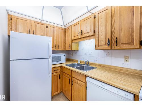 108 Forest Gv, St. Albert, AB - Indoor Photo Showing Kitchen With Double Sink