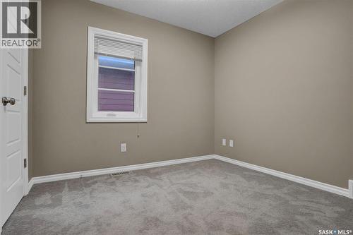 124 3229 Elgaard Drive, Regina, SK - Indoor Photo Showing Other Room